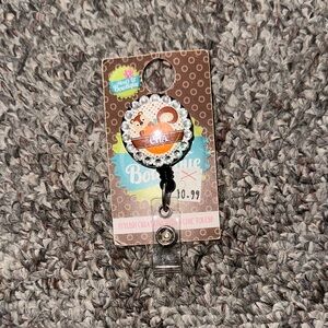 👙NWT Nina’s Lil Boutique Sparkling Squirrel CNA Badge Reel